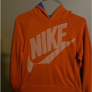 Nike boys size medium hoodie. Orange with blue lined hood